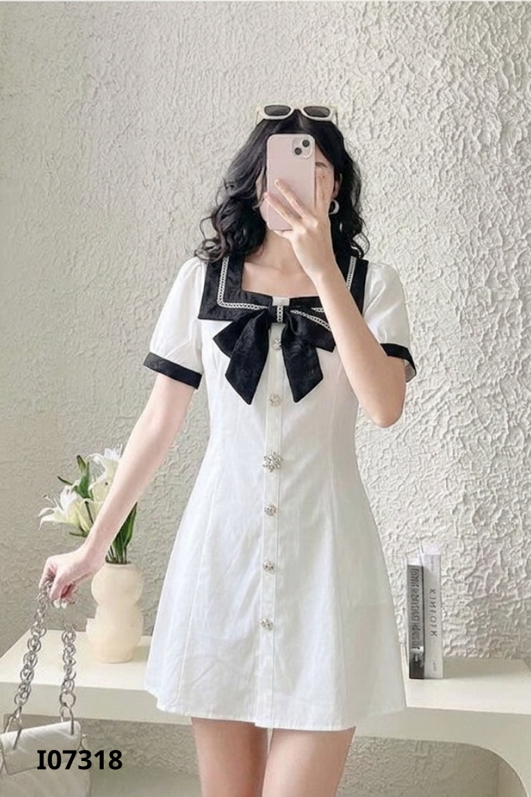Váy trắng cổ nơ đen