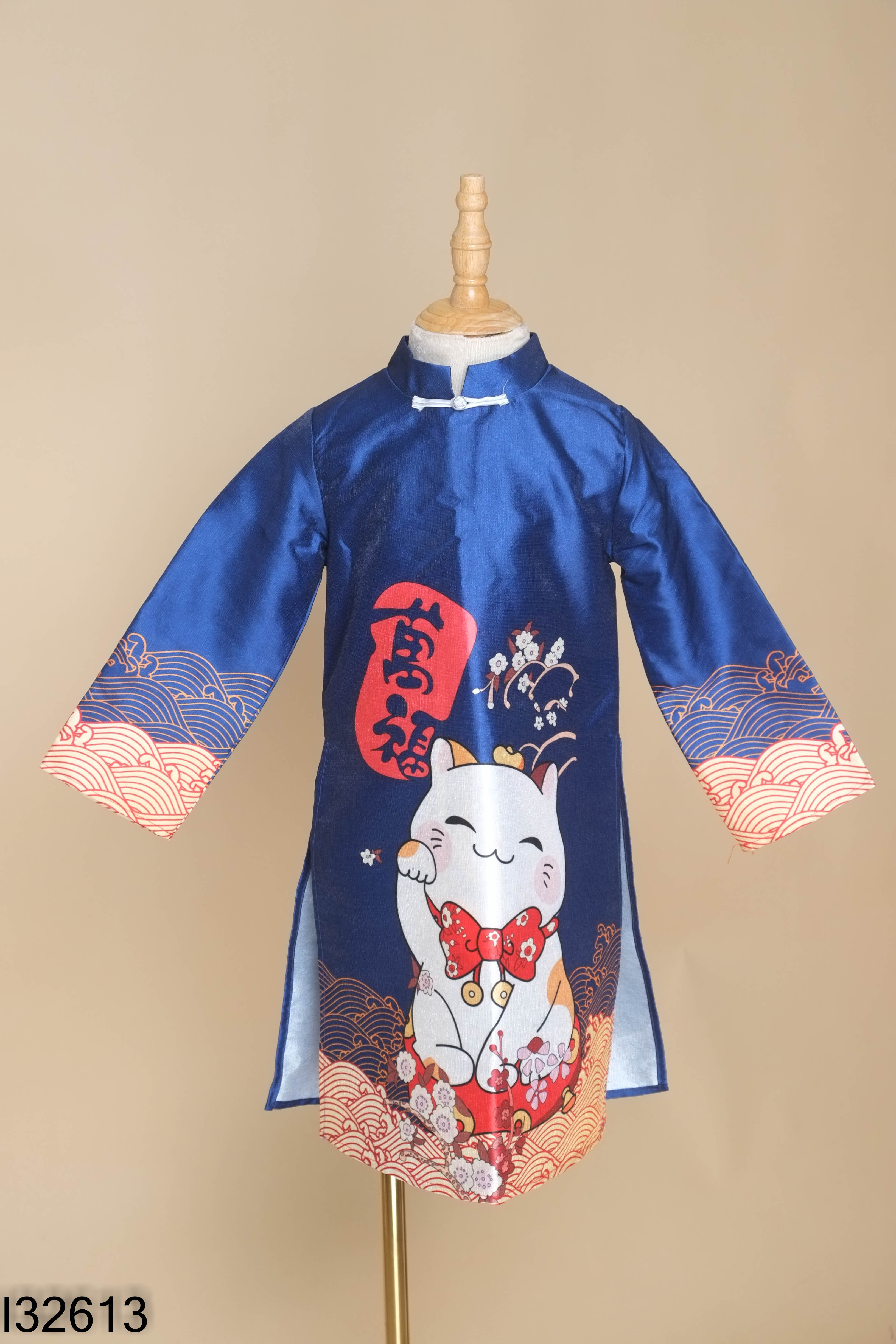 Áo dài gấm xanh họa tiết KIDS