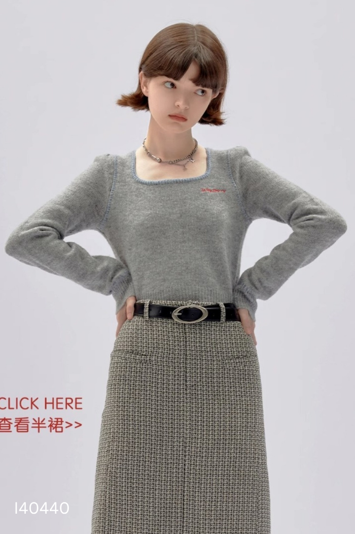 Áo len cổ tròn ghi nhũ