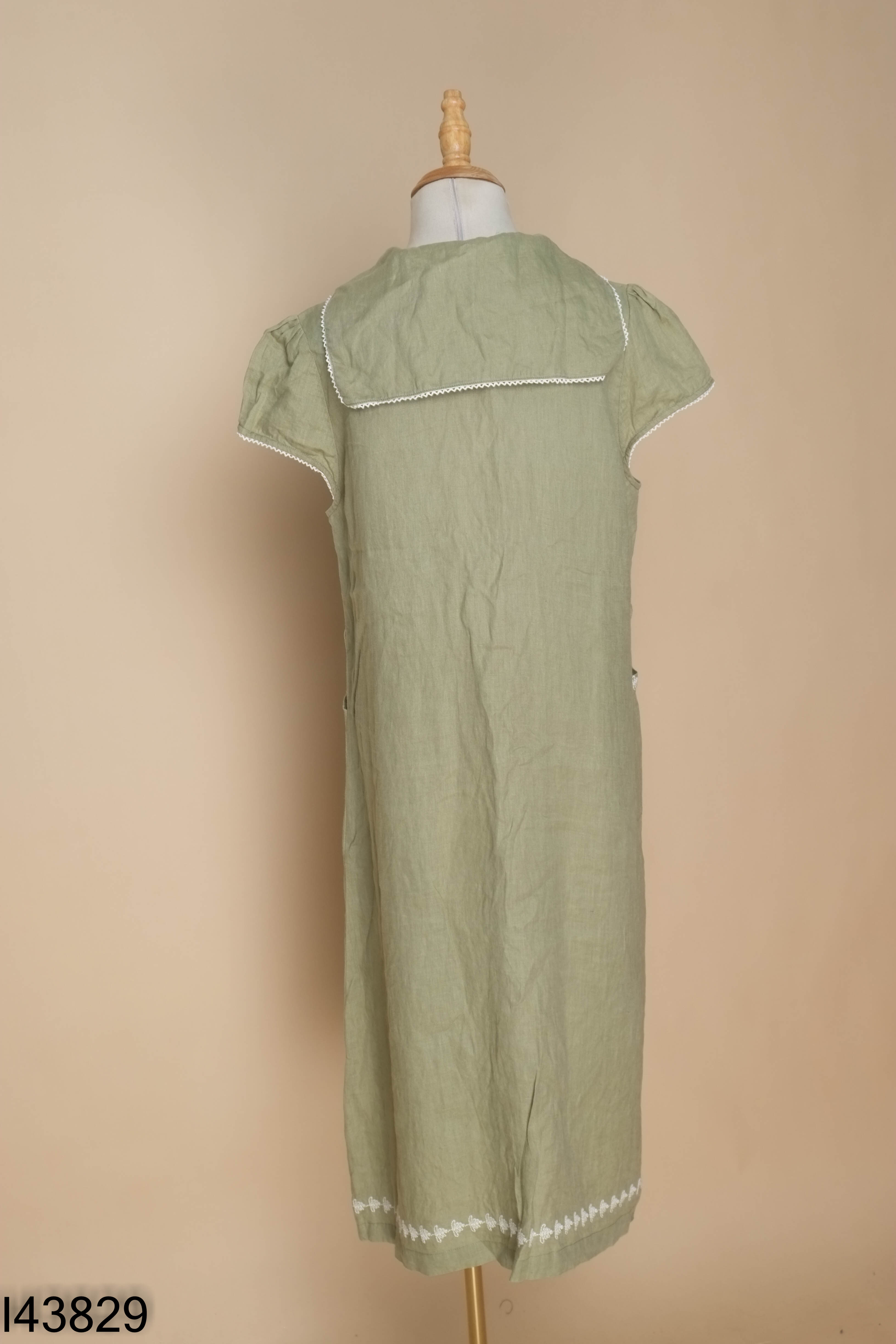 Váy linen xanh rêu viền be