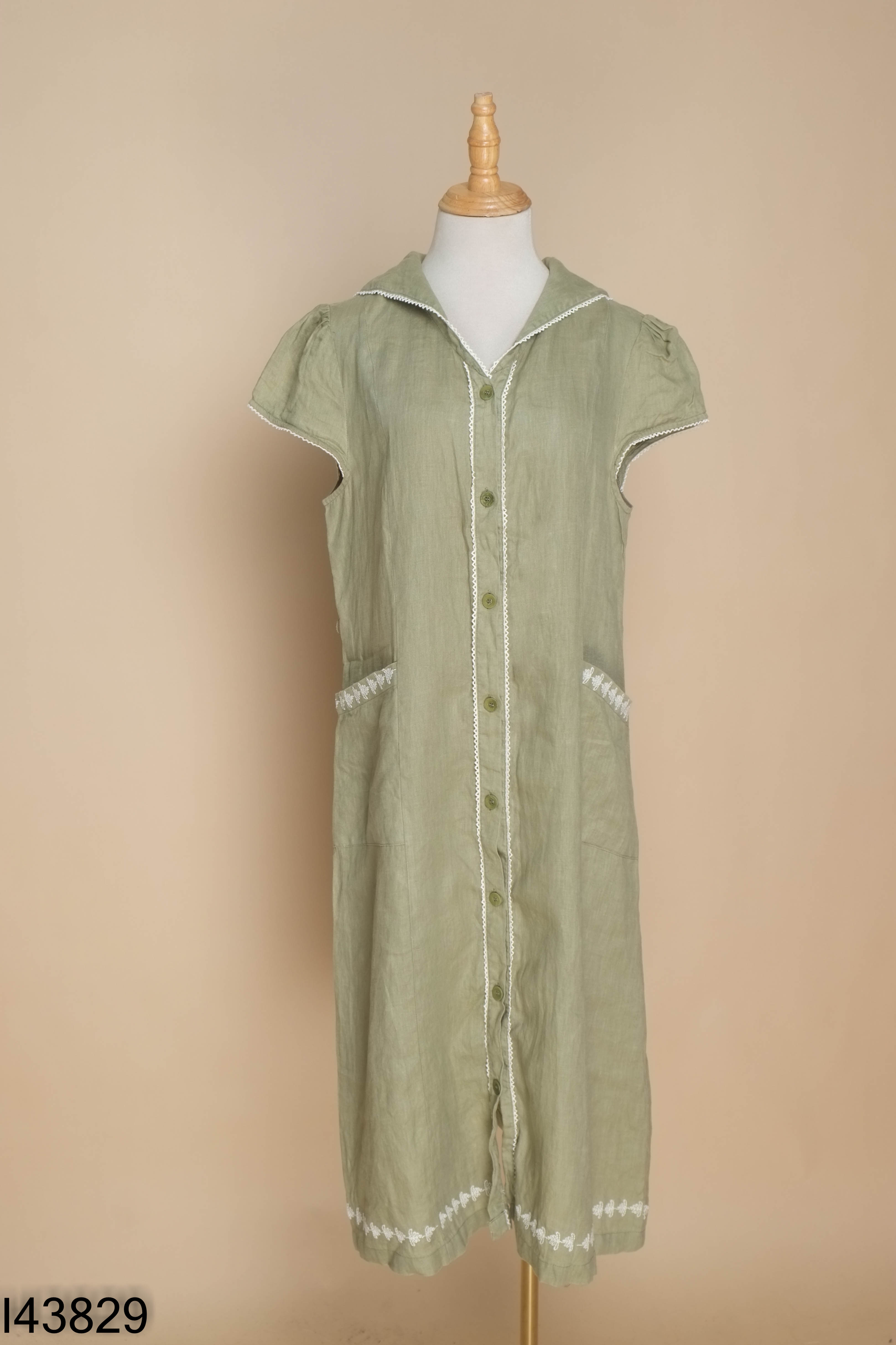 Váy linen xanh rêu viền be