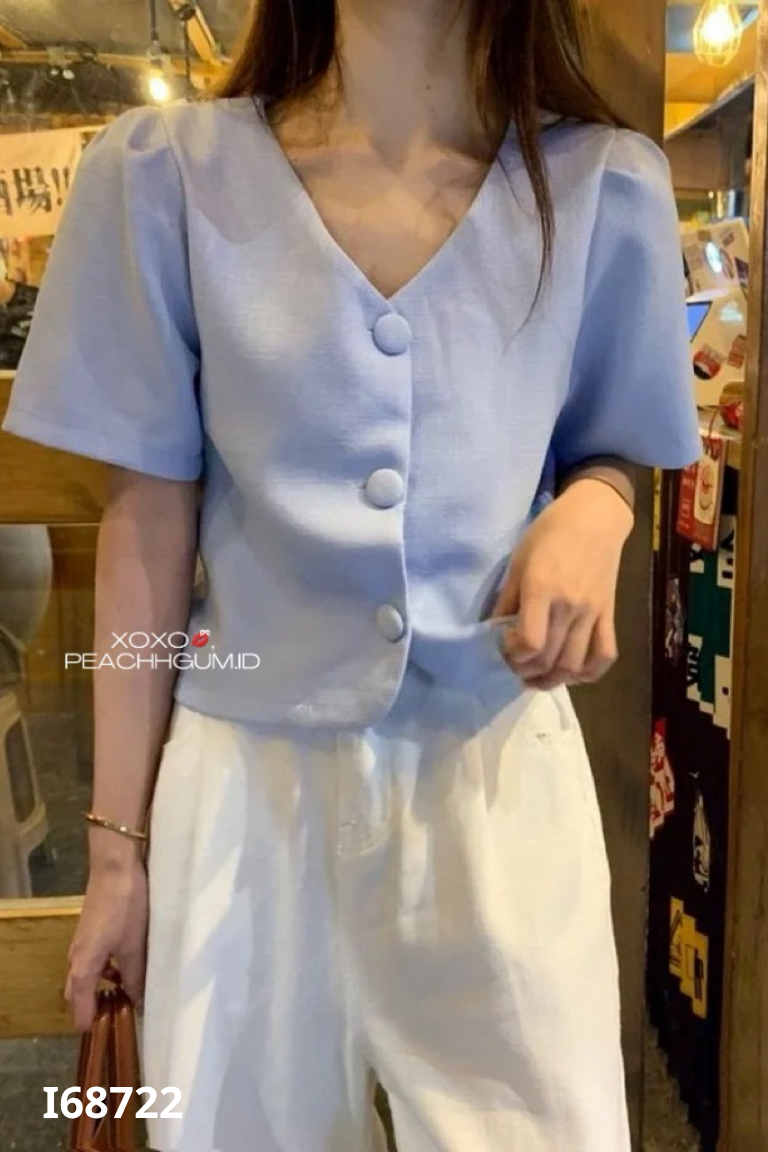 Áo xanh phối cúc