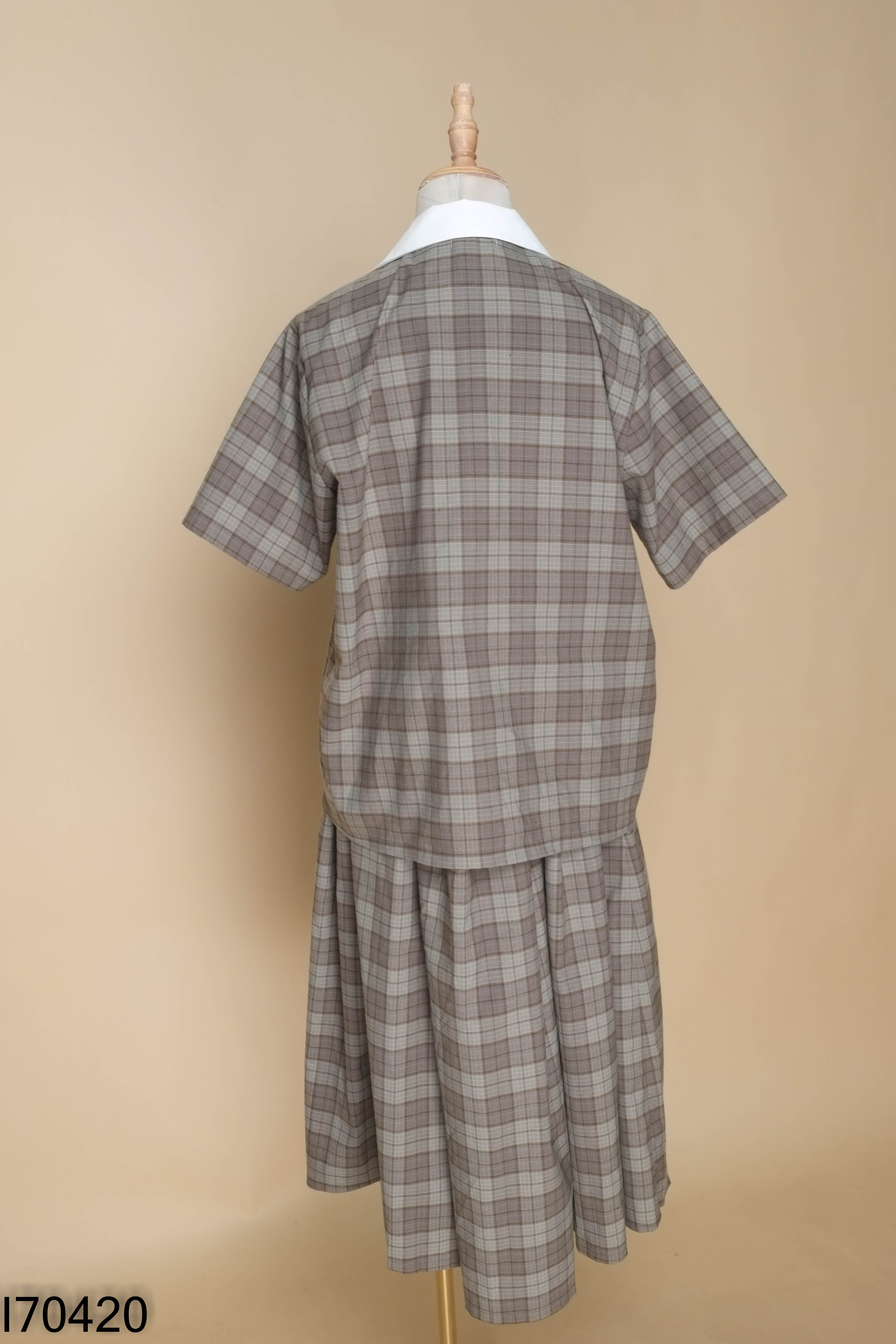 Set áo cổ vest + chân váy xanh caro