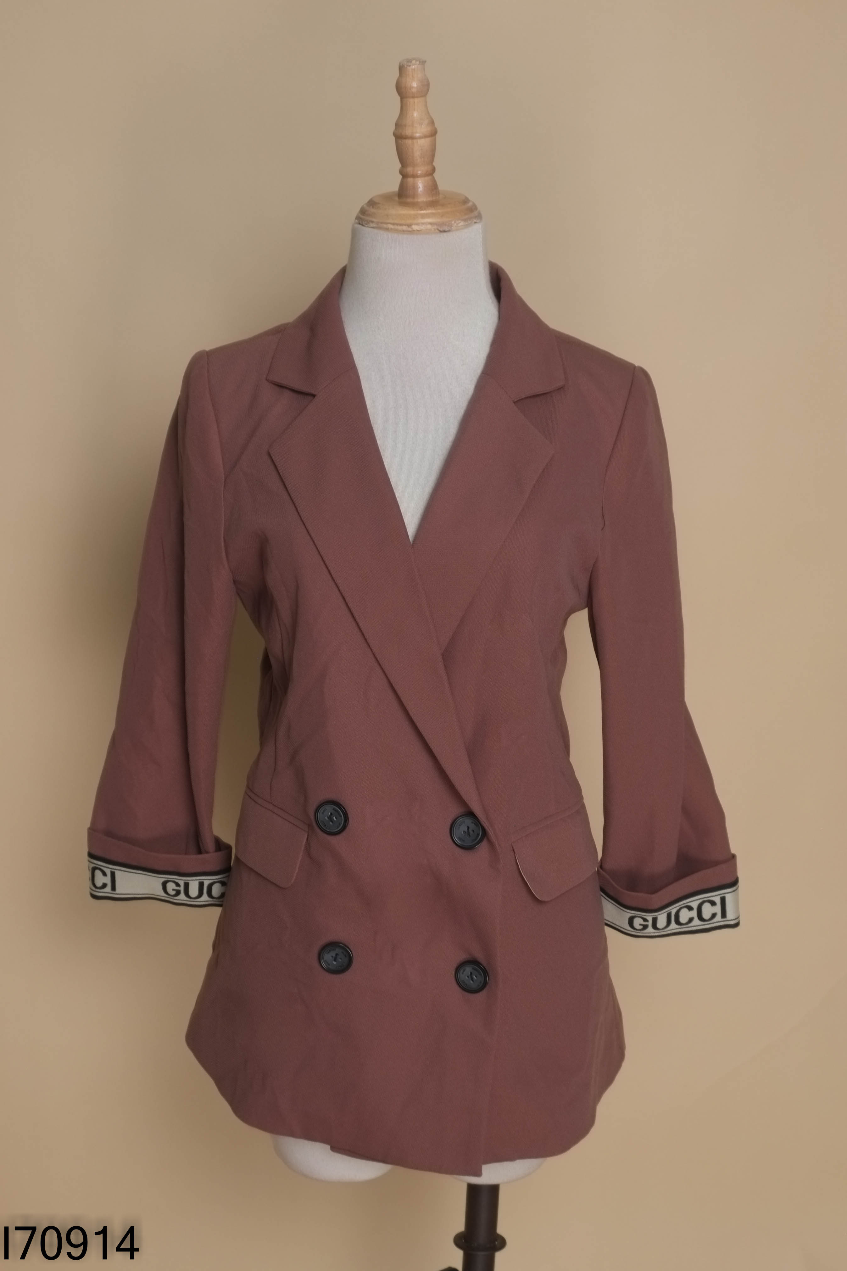 Áo vest nâu tay lỡ