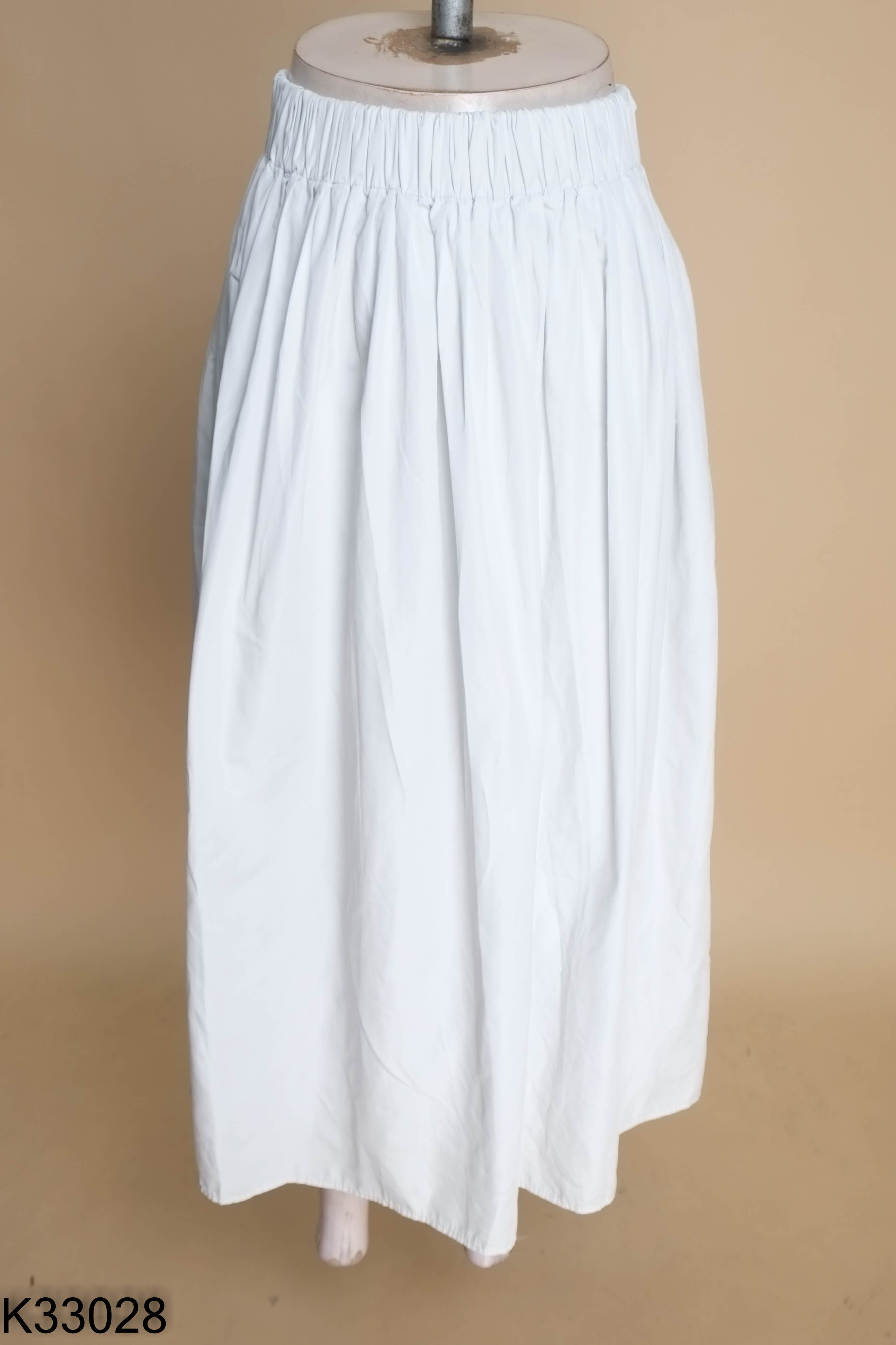 Chân váy UNIQLO dù xanh