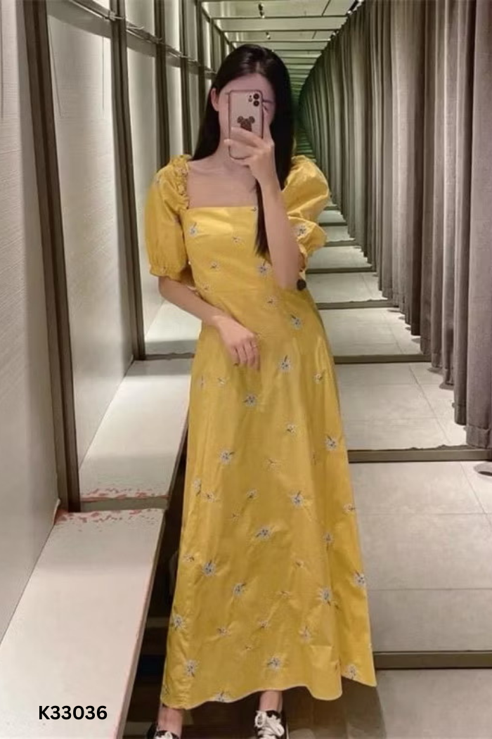 Váy vàng dúm ngực thêu hoa