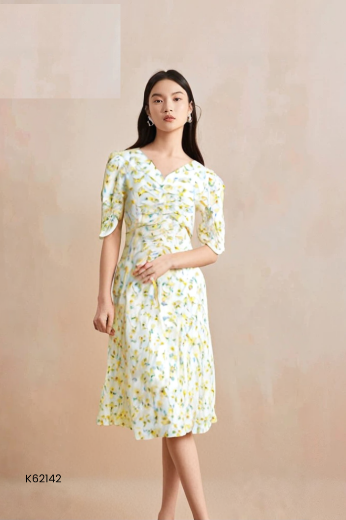 Váy nhỡ nền trắng hoa vàng