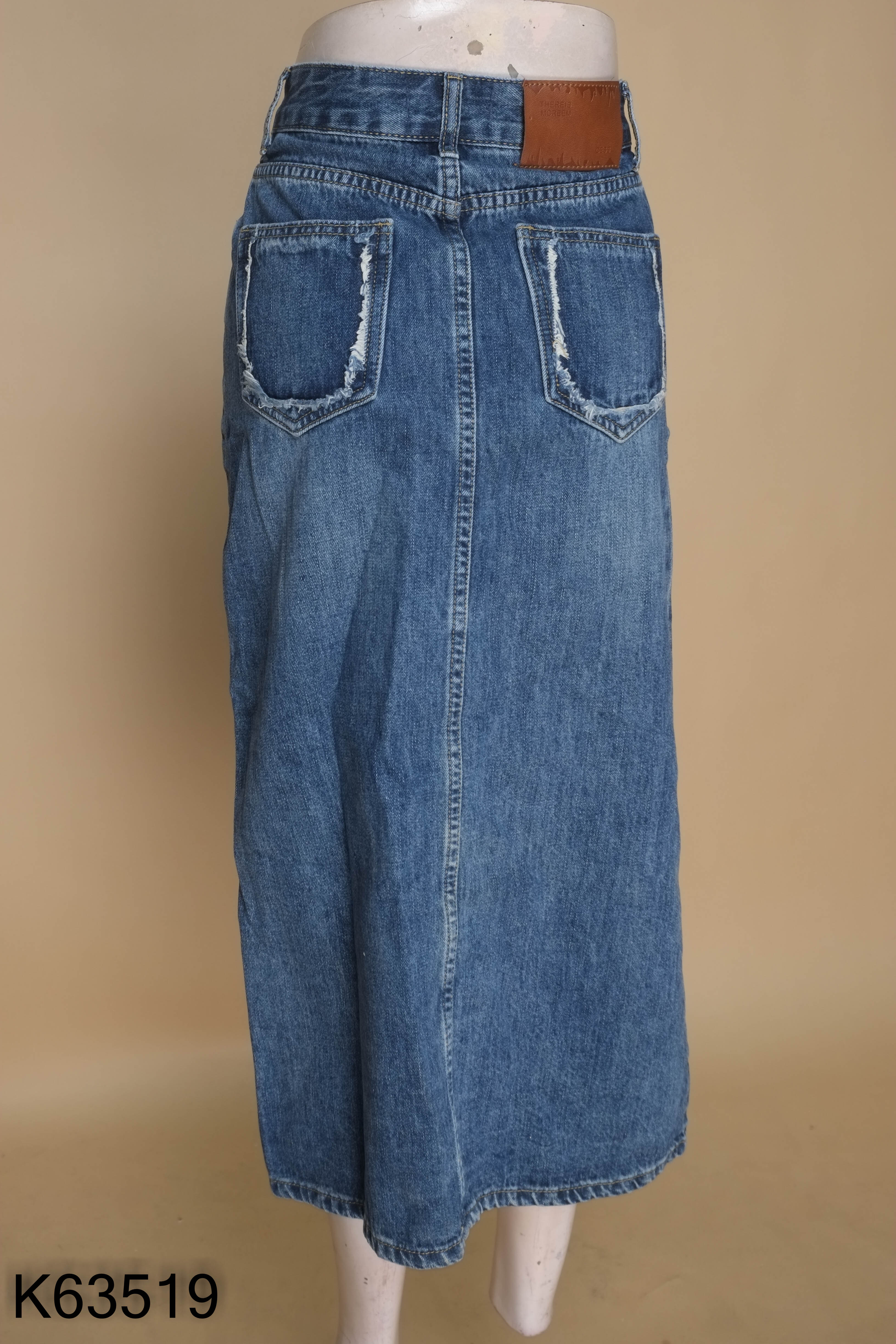 Chân váy jeans xanh viền tua rua