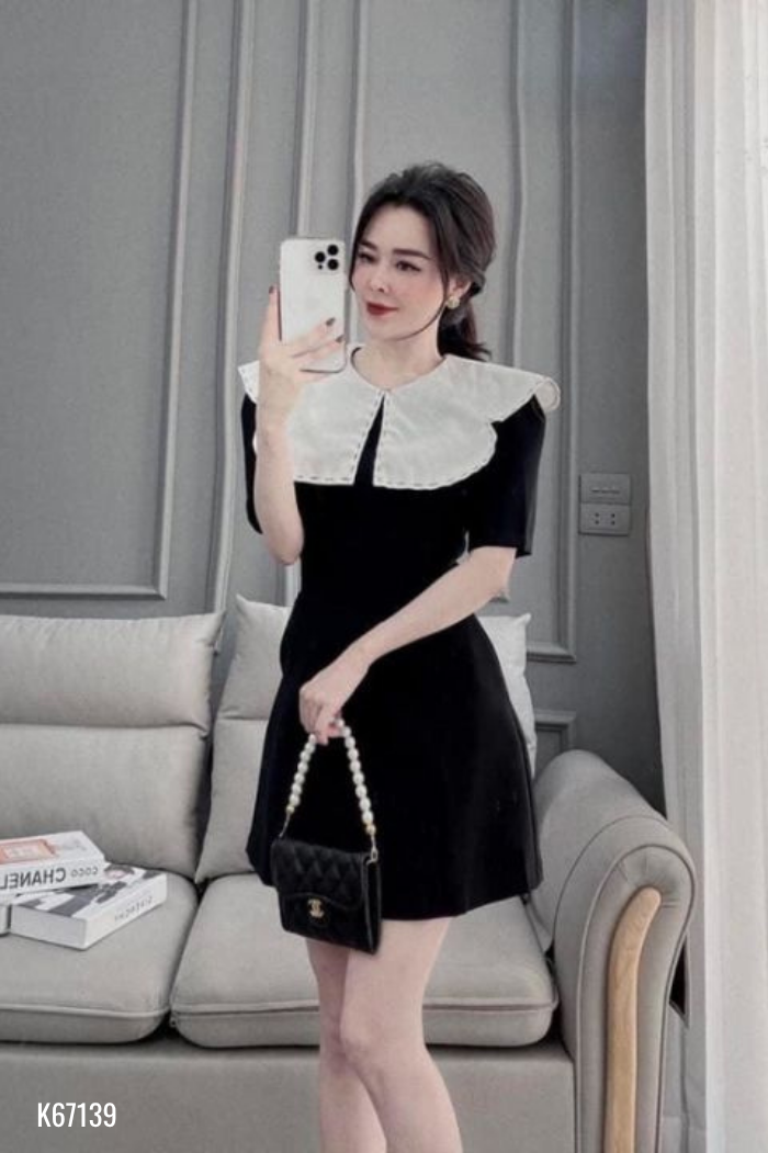 Váy đen cổ trắng