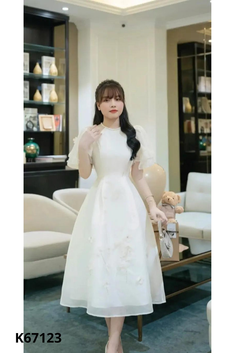 Váy be họa tiết phối tay voan