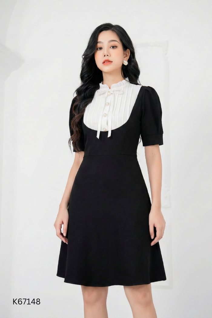 Váy đen phối cúc ngọc