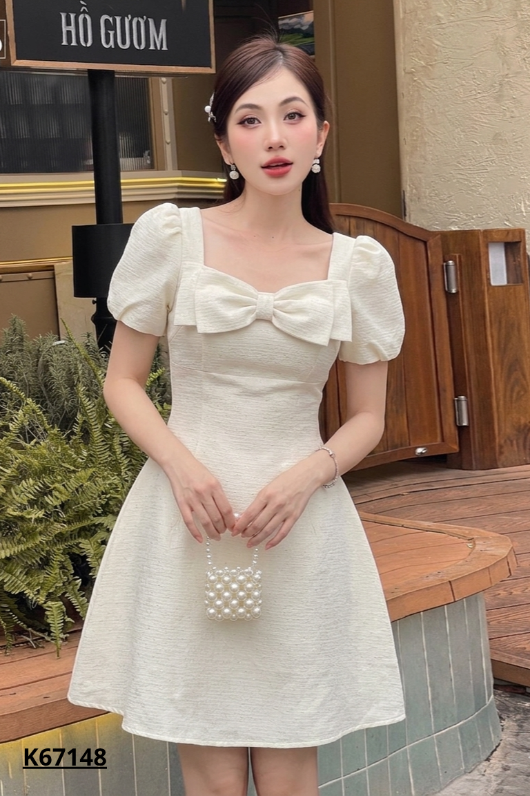 Váy taffta be phối nơ
