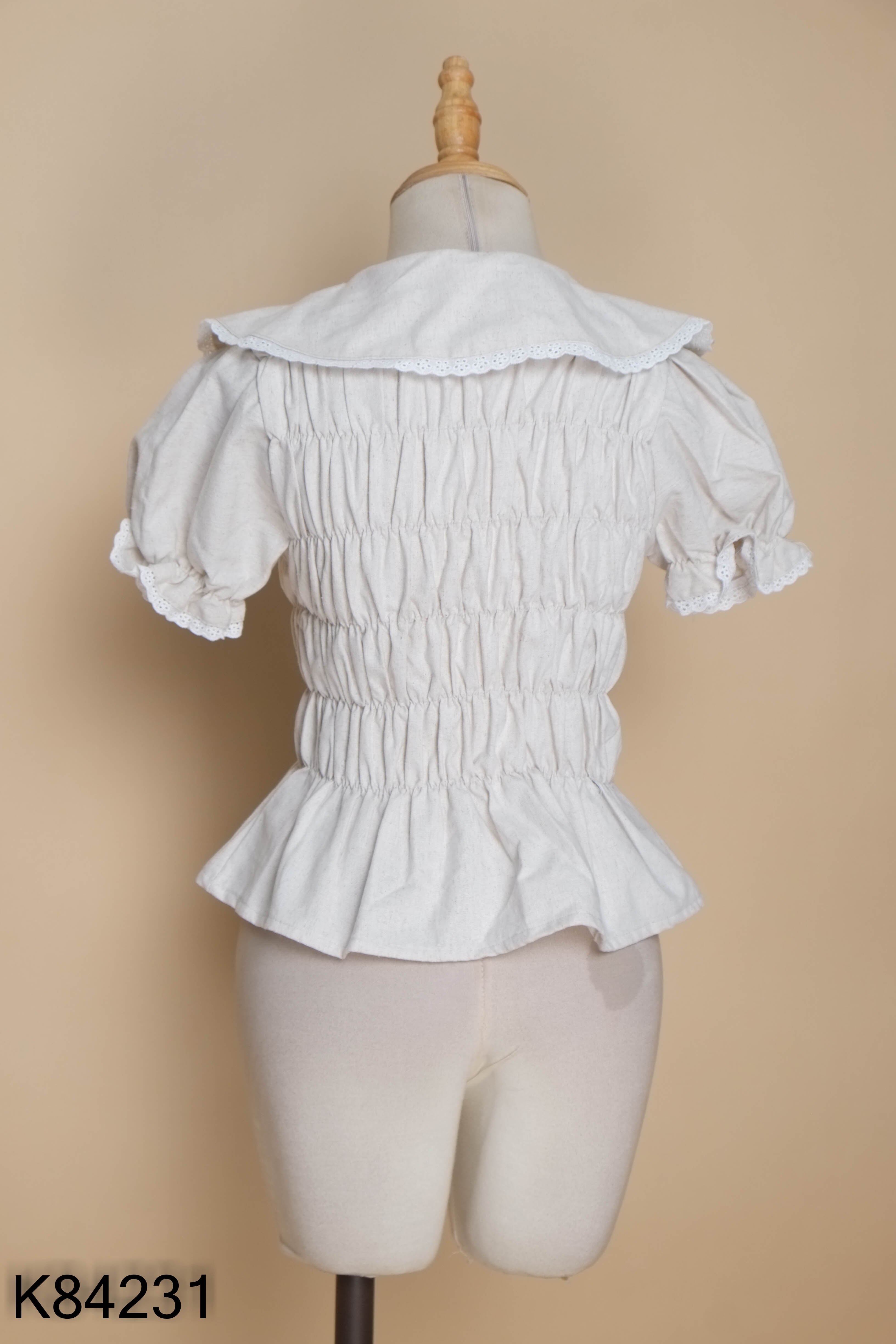 Áo linen be chun cổ sen