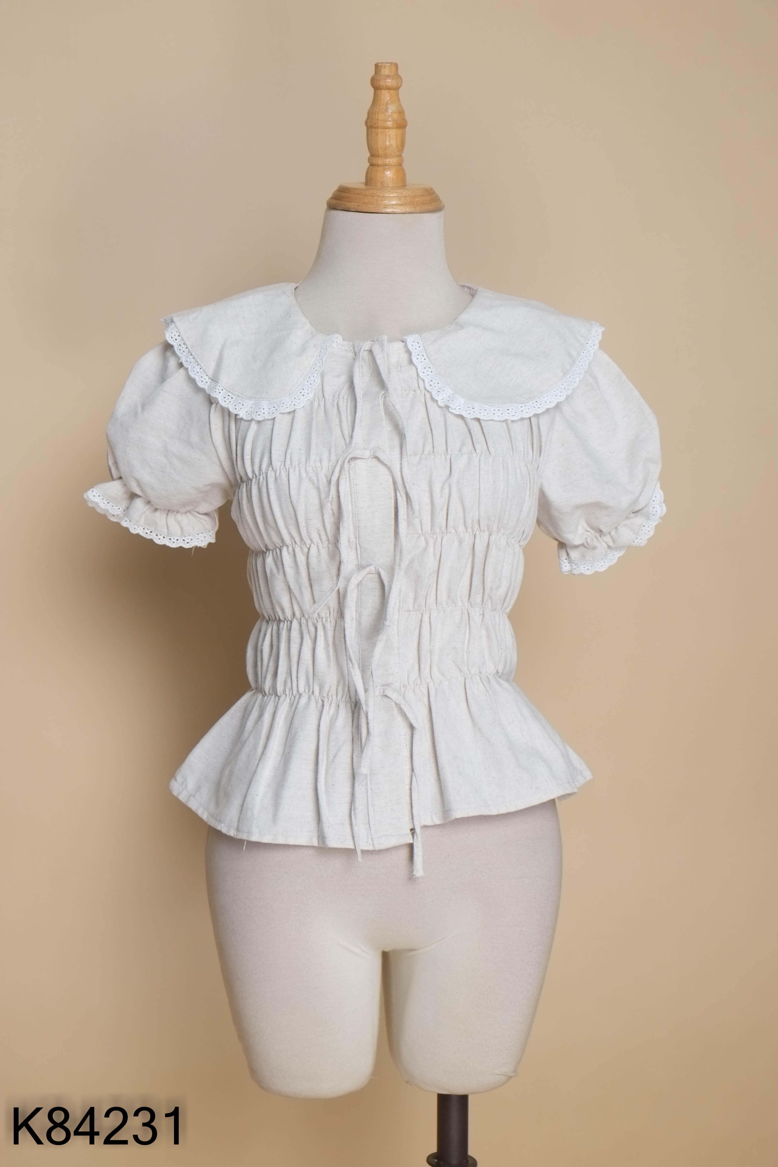 Áo linen be chun cổ sen