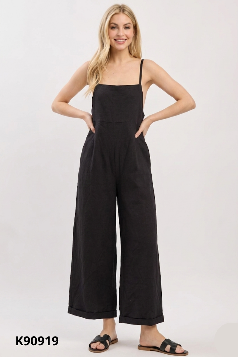 Jumpsuit GU đen trơn