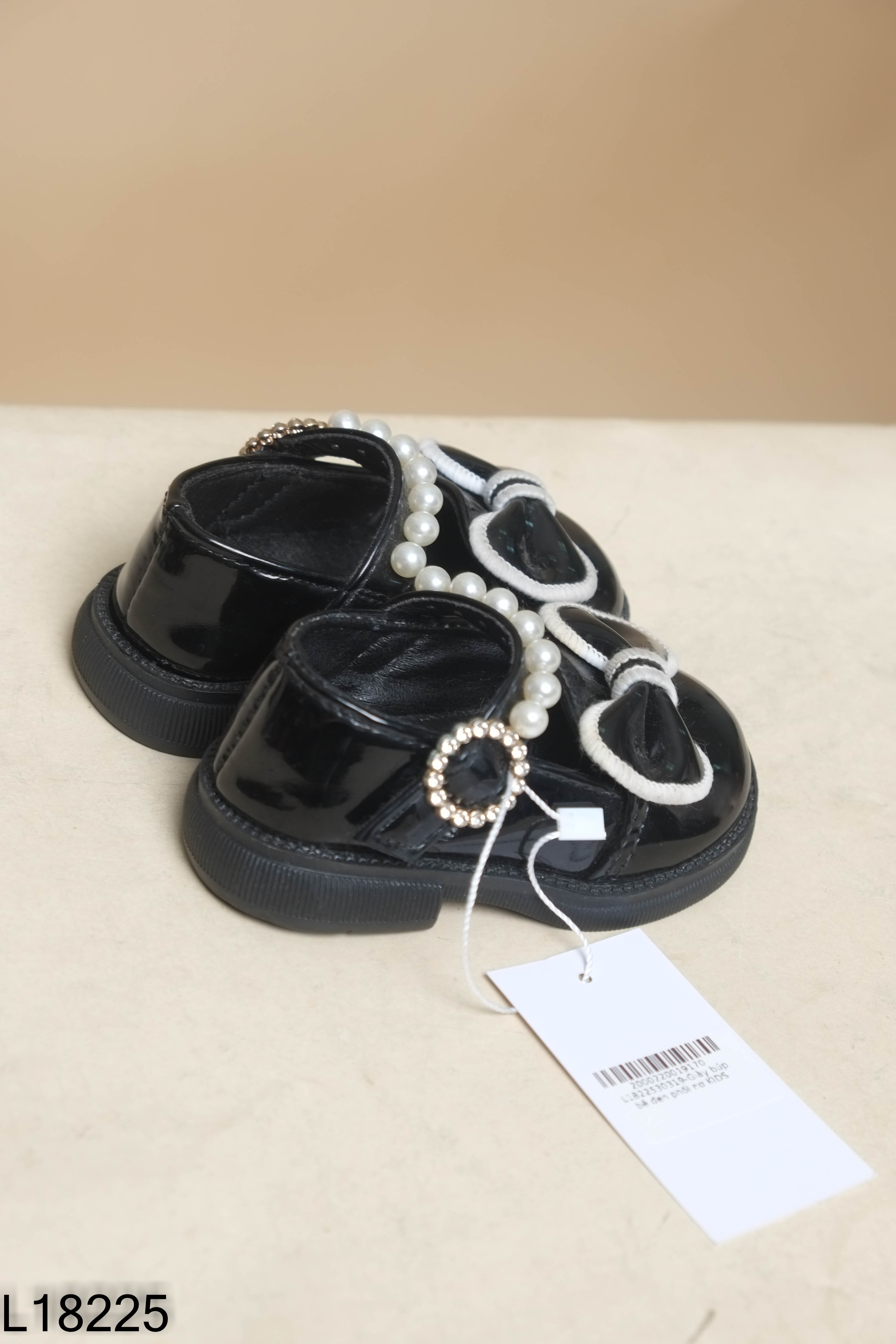 Giày búp bê đen phối nơ KIDS