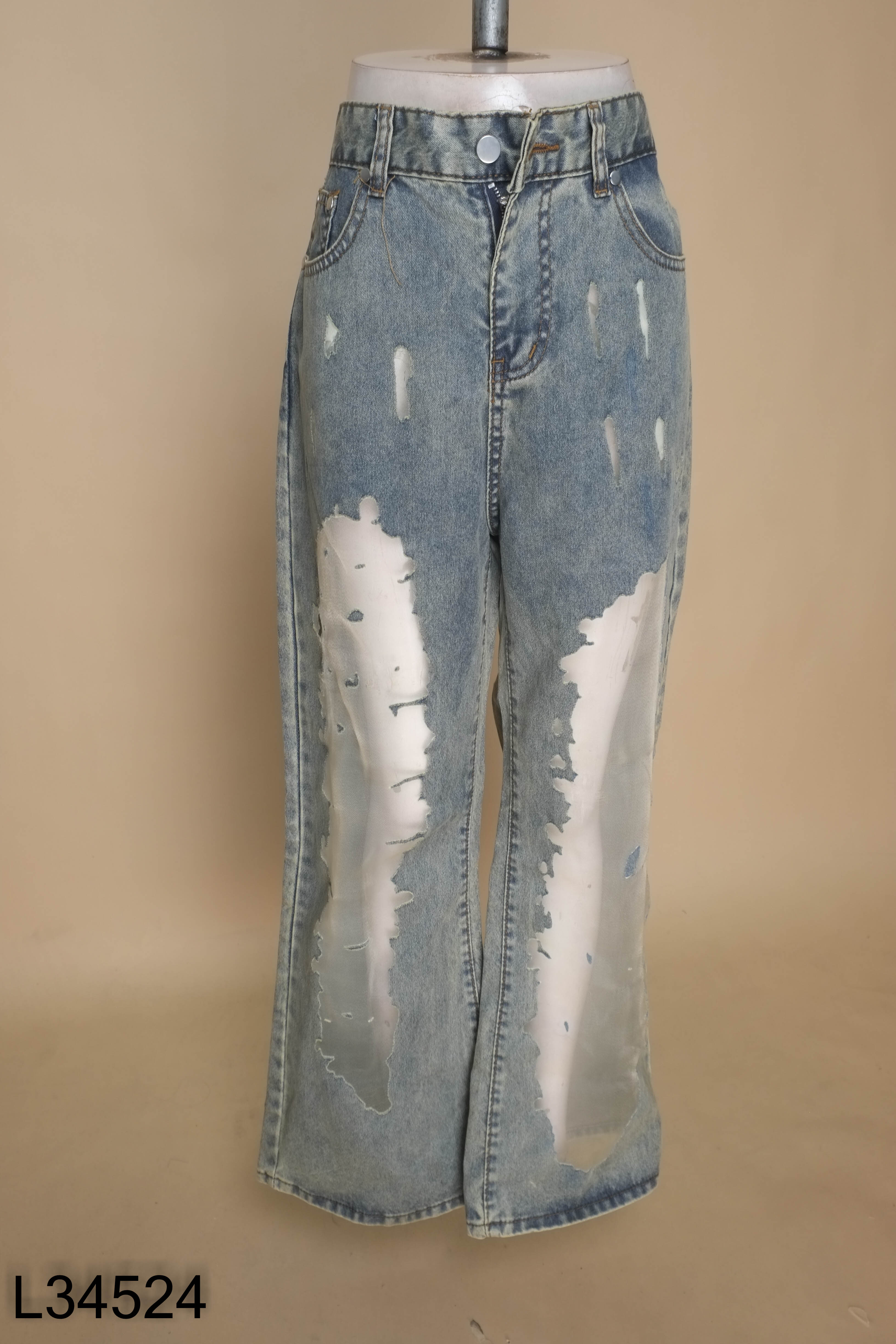 Quần jeans xanh phối lưới