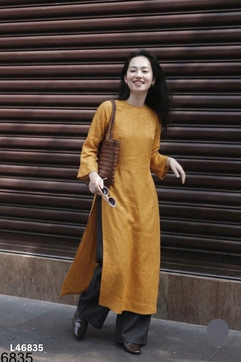 SET áo dài cam+ quần đen