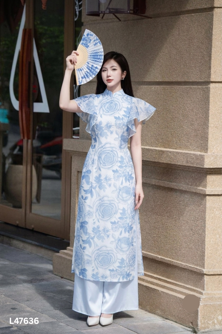 Áo dài voan trăng họa tiết hoa xanh