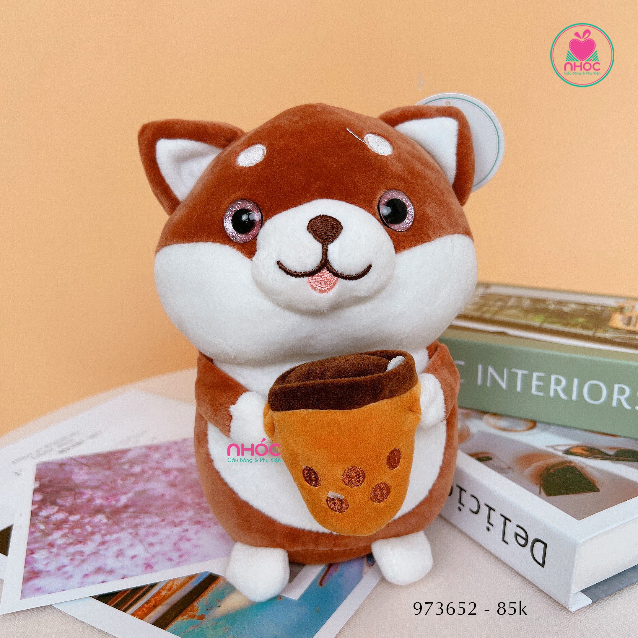 Thú bông nhỏ chó Shiba ôm trà sữa
