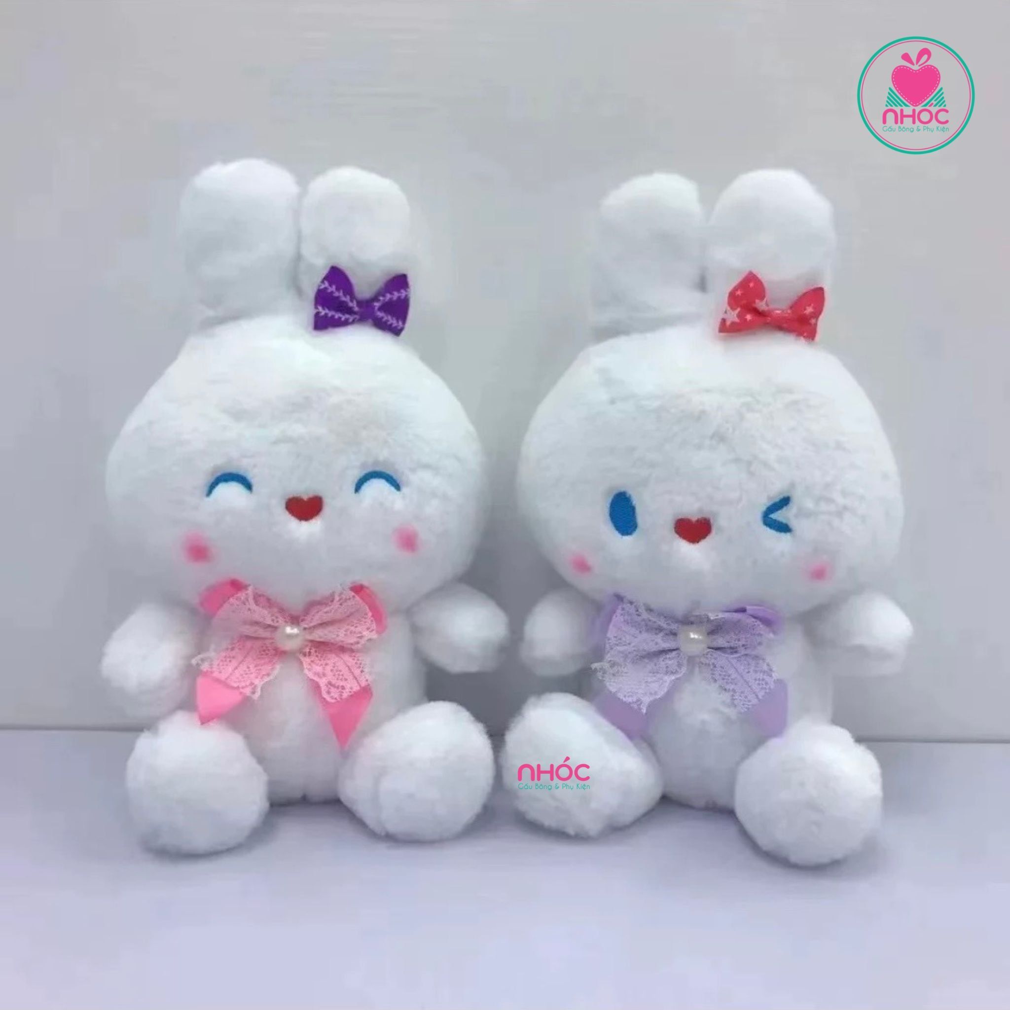 Thú bông nhỏ Thỏ mũi tim đeo nơ lông xù - Trắng - 9501