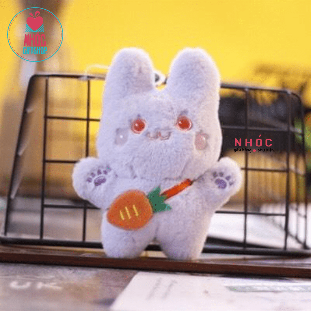Móc khóa bông thỏ đeo túi cà rốt - Tím - 7501