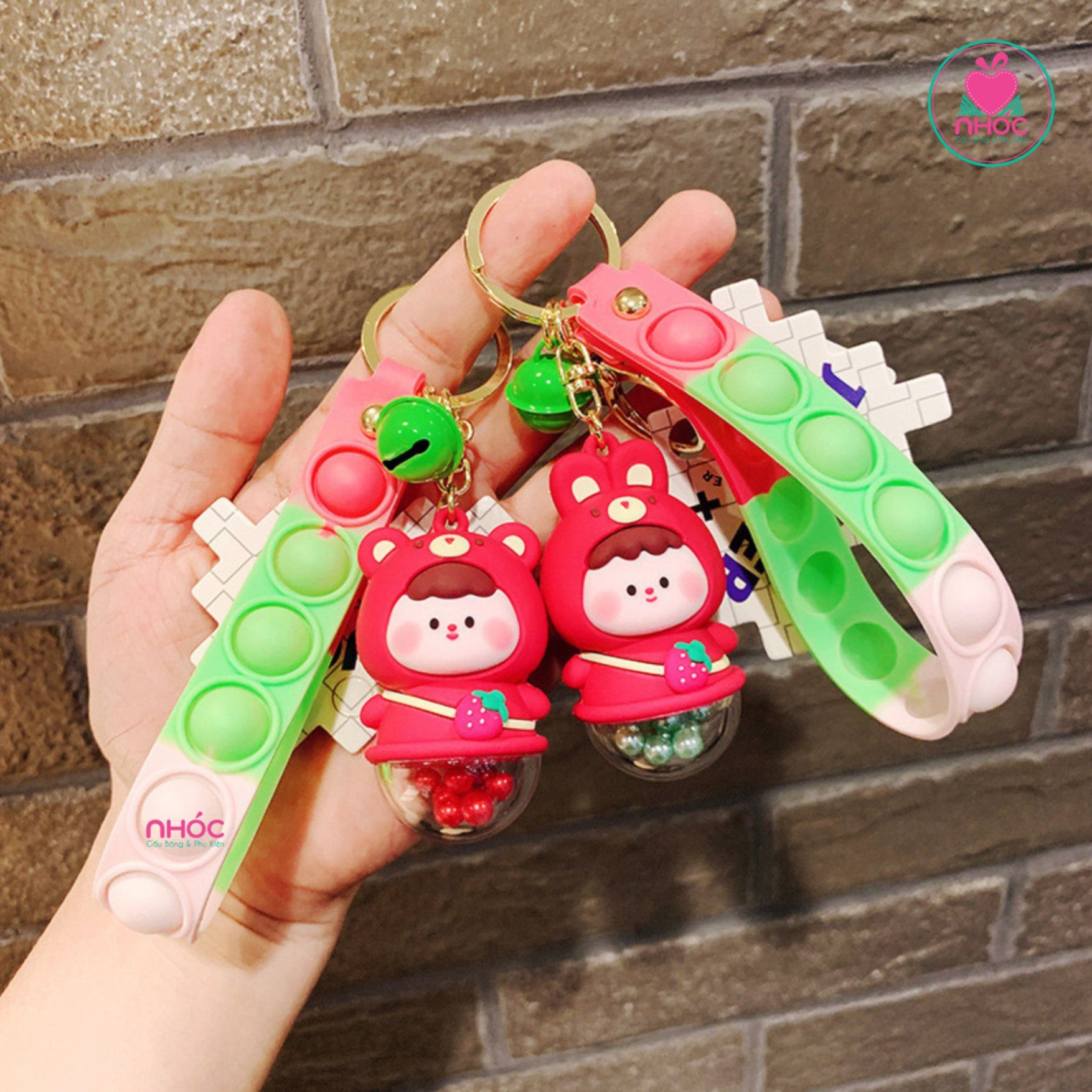 Móc khoá poly bé mặc áo Toy Story chuông bóp bíp - Hồng đậm - 6501