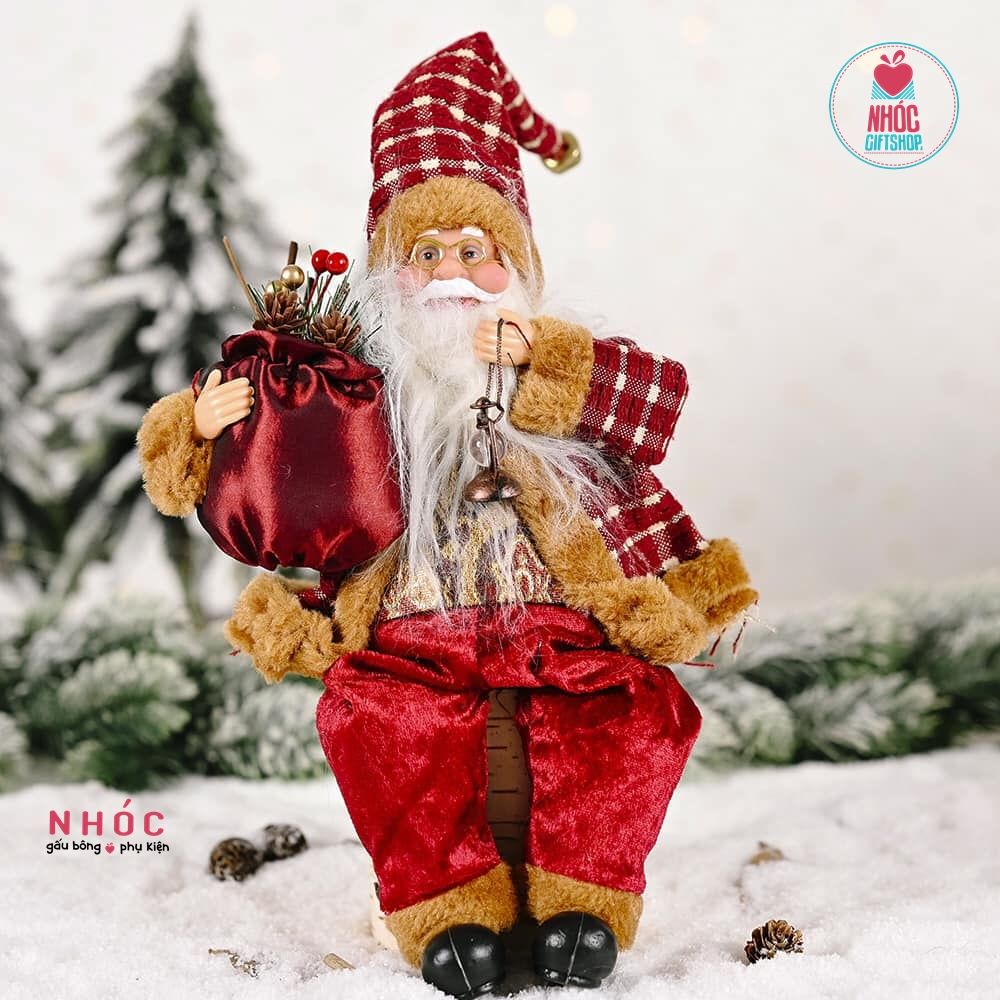 Ông già Noel ngồi cầm túi xách đèn - 24001
