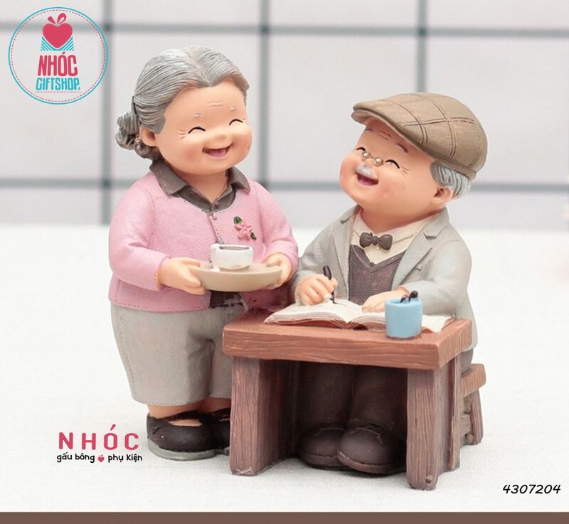 Tượng ông bà già ngồi viết sách uống trà - 33001