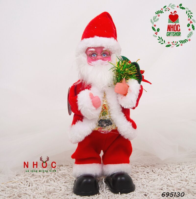 Ông già noel đứng cầm túi hộp quà - 24001