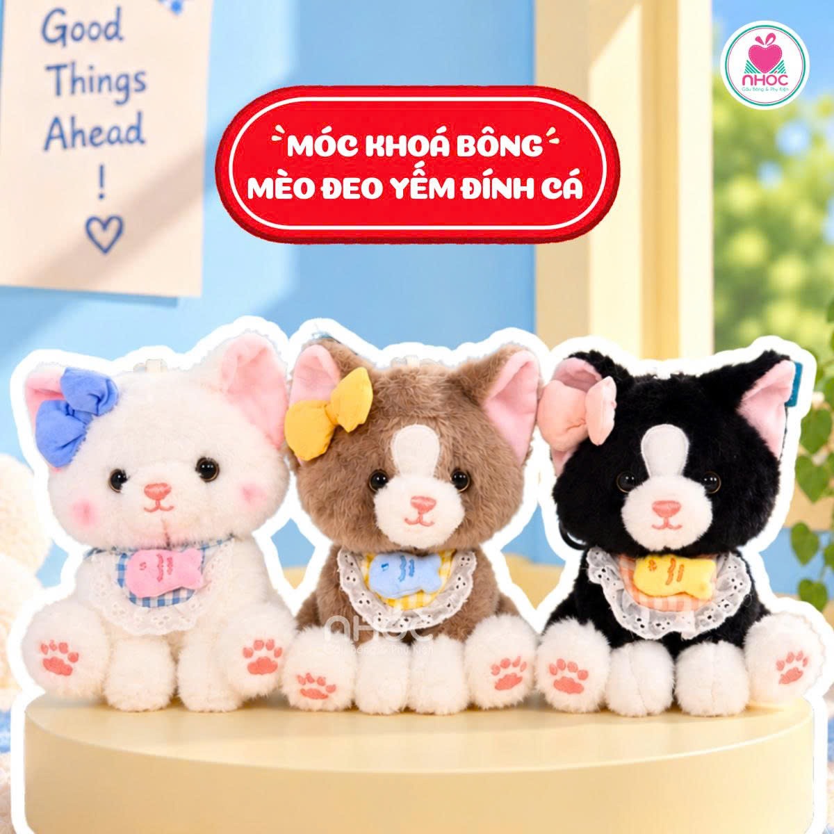 Móc khoá bông Mèo đeo yếm đính cá lông xù ngồi