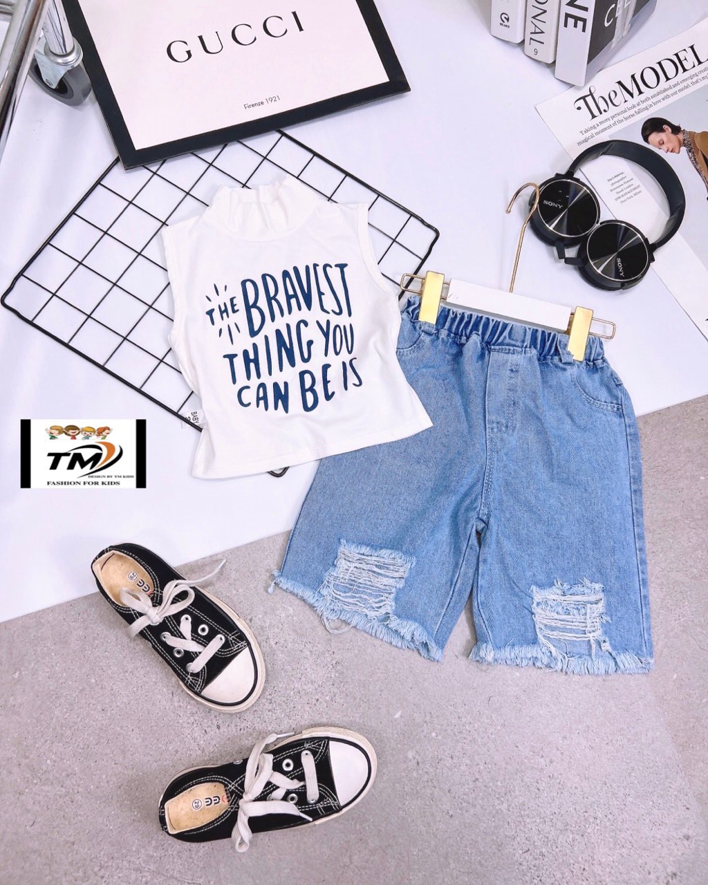 Bộ áo croptop bravest quần bò bé gái