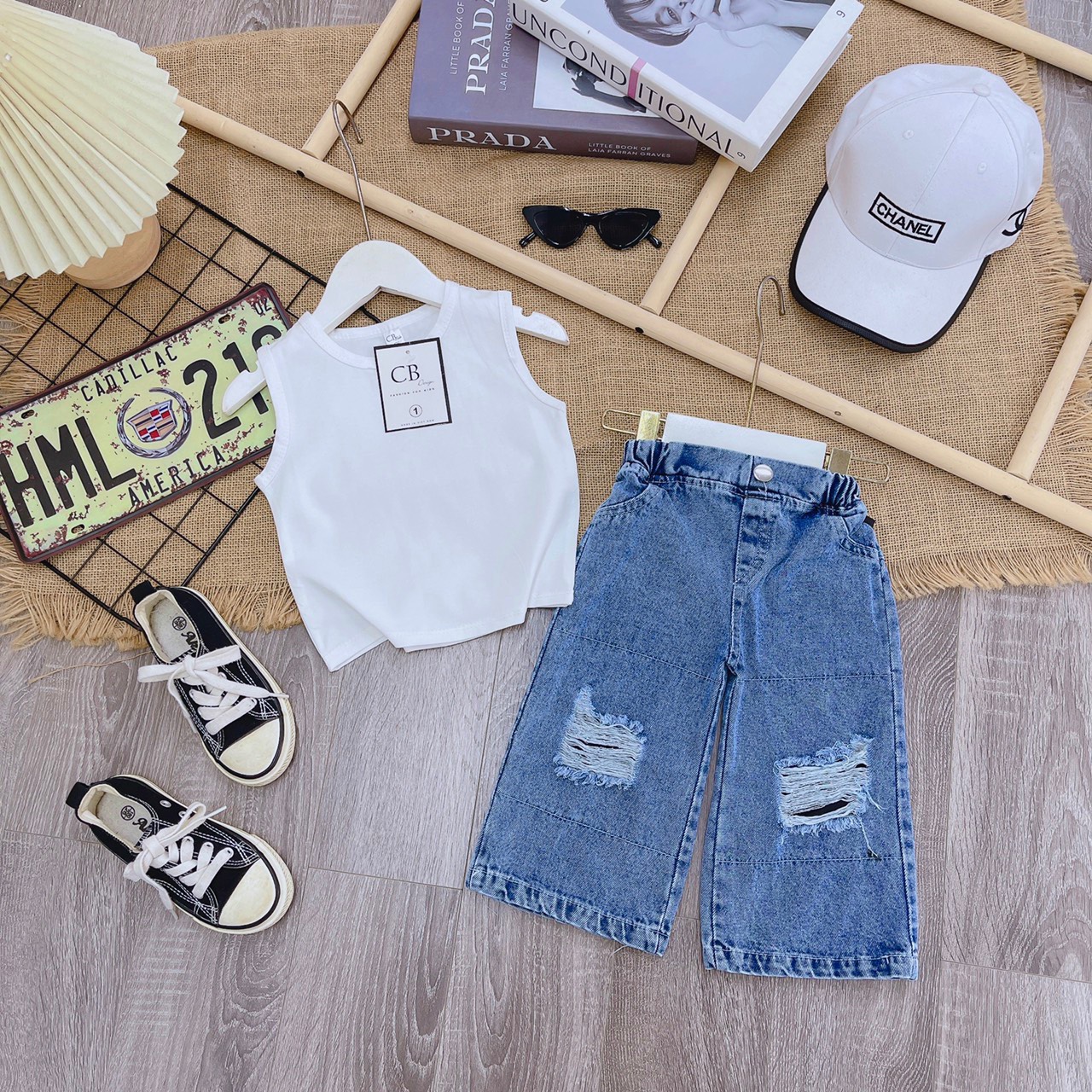Bg25- bộ áo croptop đen trắng quần bò cb xanh rách cho bé