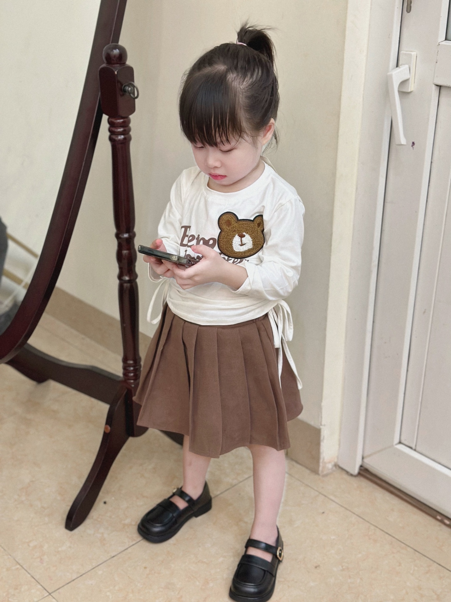 Áo gấu rút dây cv nâu cho bé