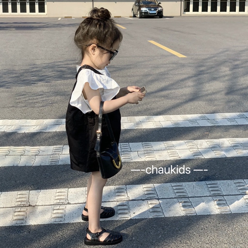 Yếm đen kèm áo tay bèo trắng cho bé