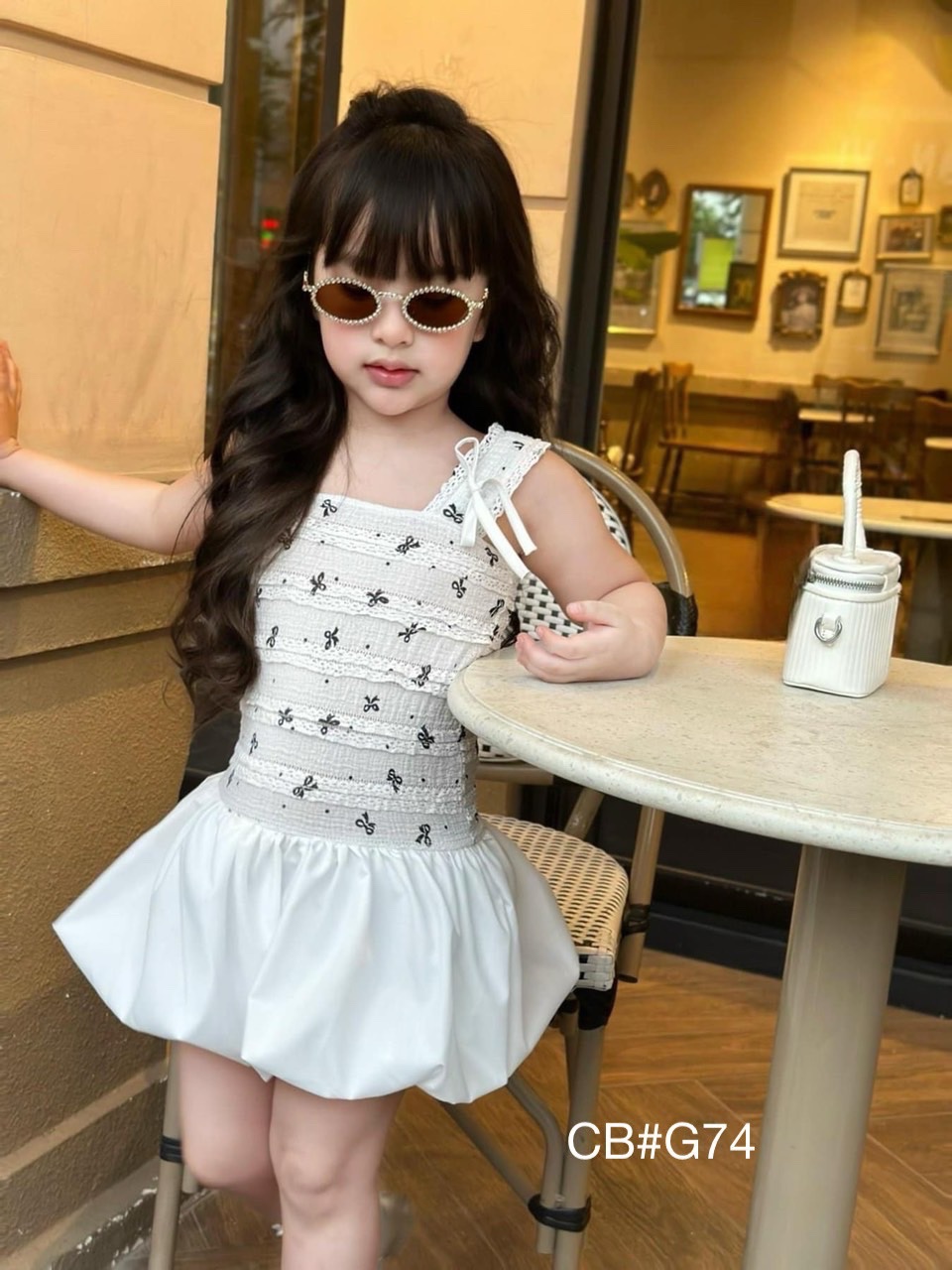 Sét váy 2 dây hình nơ in tràn thân dưới bồng cho bé