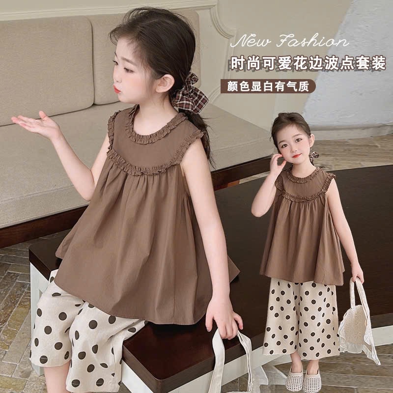 Áo nâu babydoll quần bi xuông bé gái