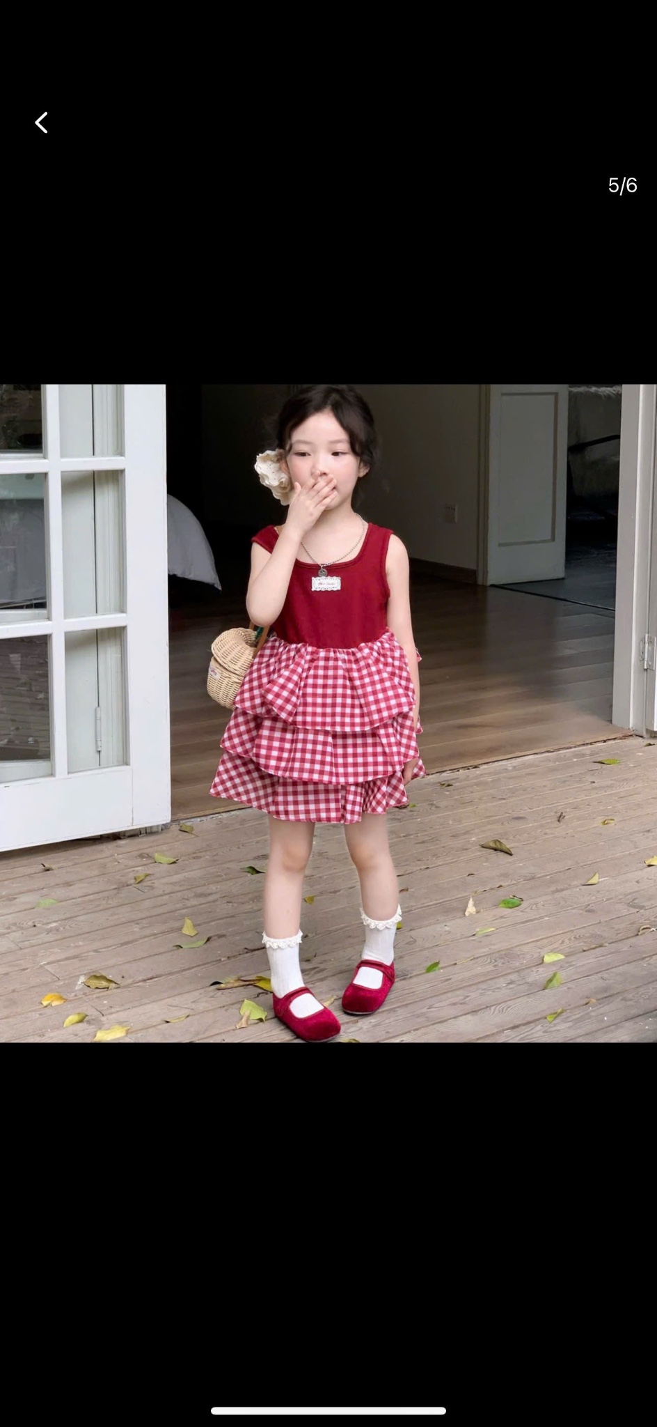 Váy phối tầng caro kèm buộc tóc bé gái
