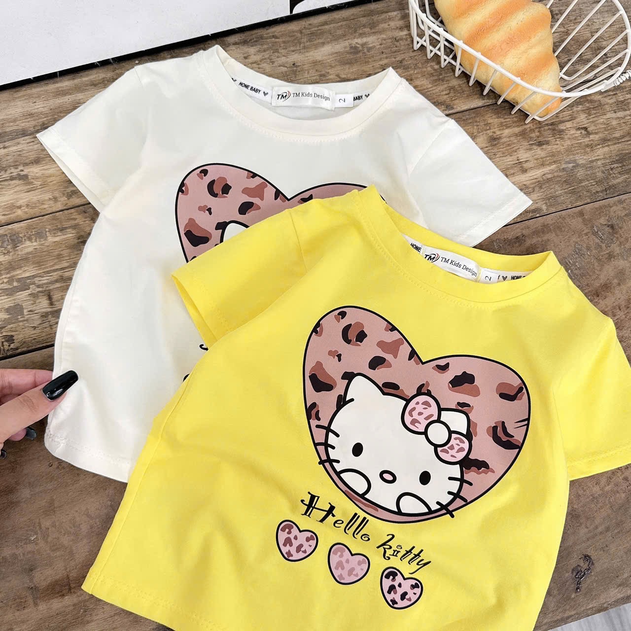 Sét áo kitty quần bò lỡ bé gái tm