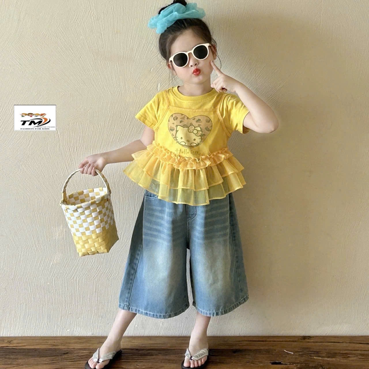 Sét áo kitty quần bò lỡ bé gái tm