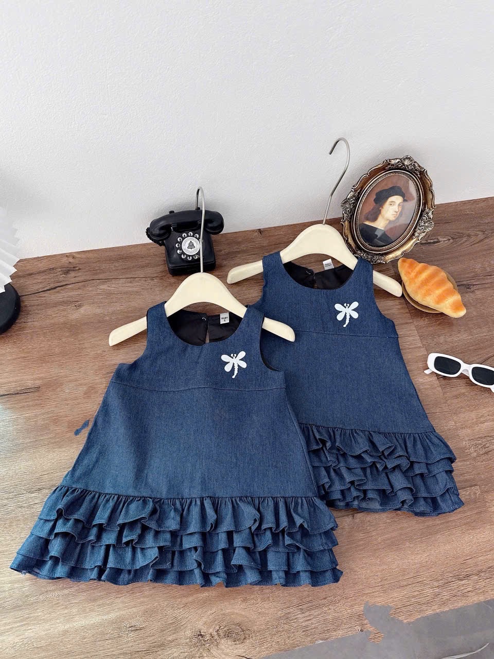 Váy bò tầng chuồn chuồn bé gái