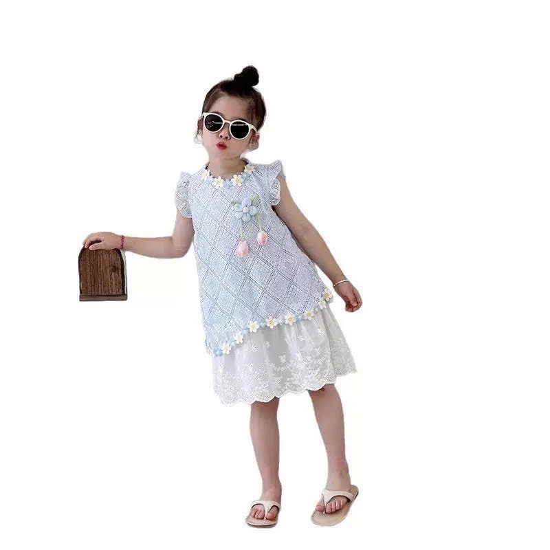 Váy xanh lưới hoa tuy lip bé gái