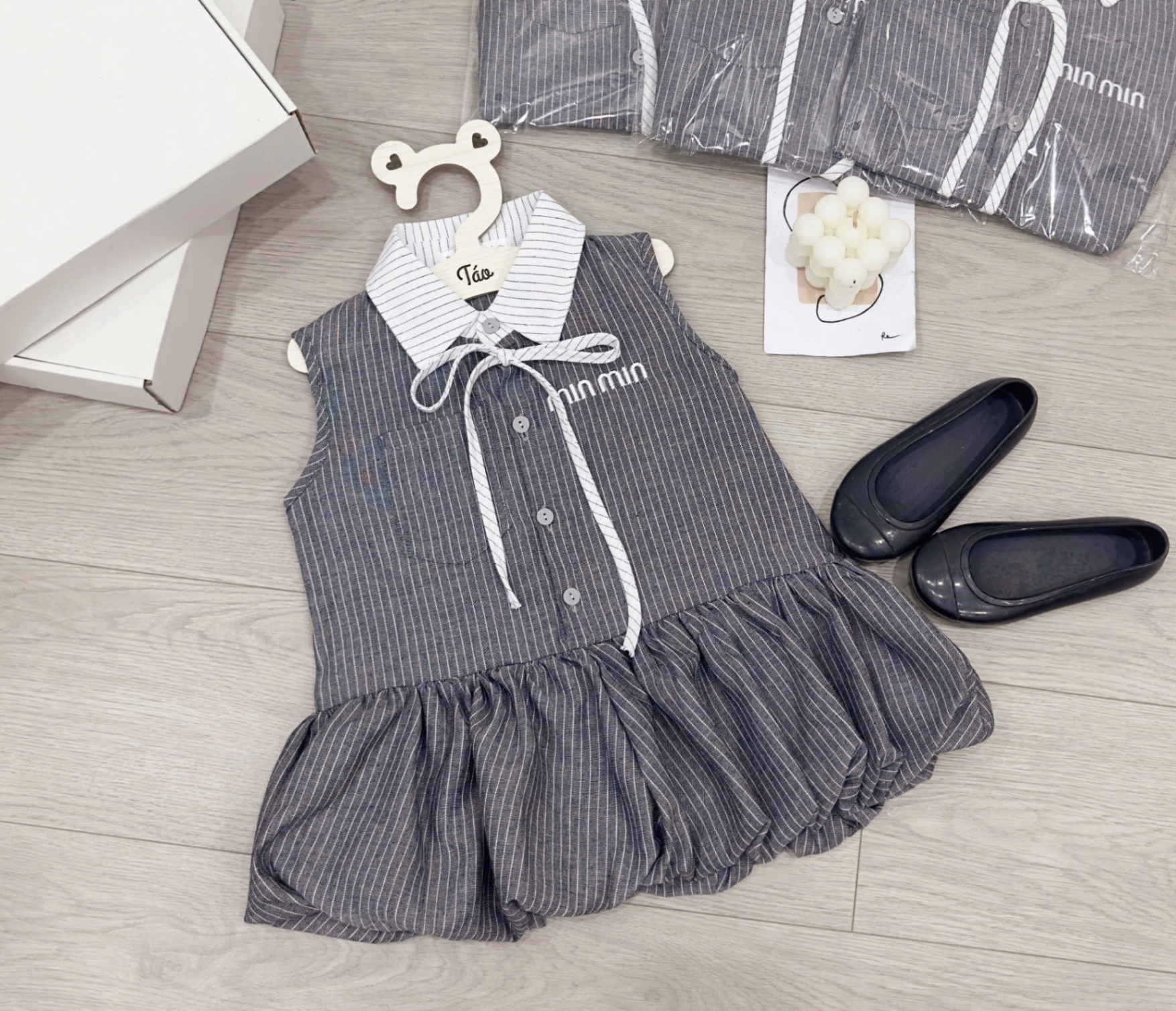 Váy kẻ miu thân bồng bé gái