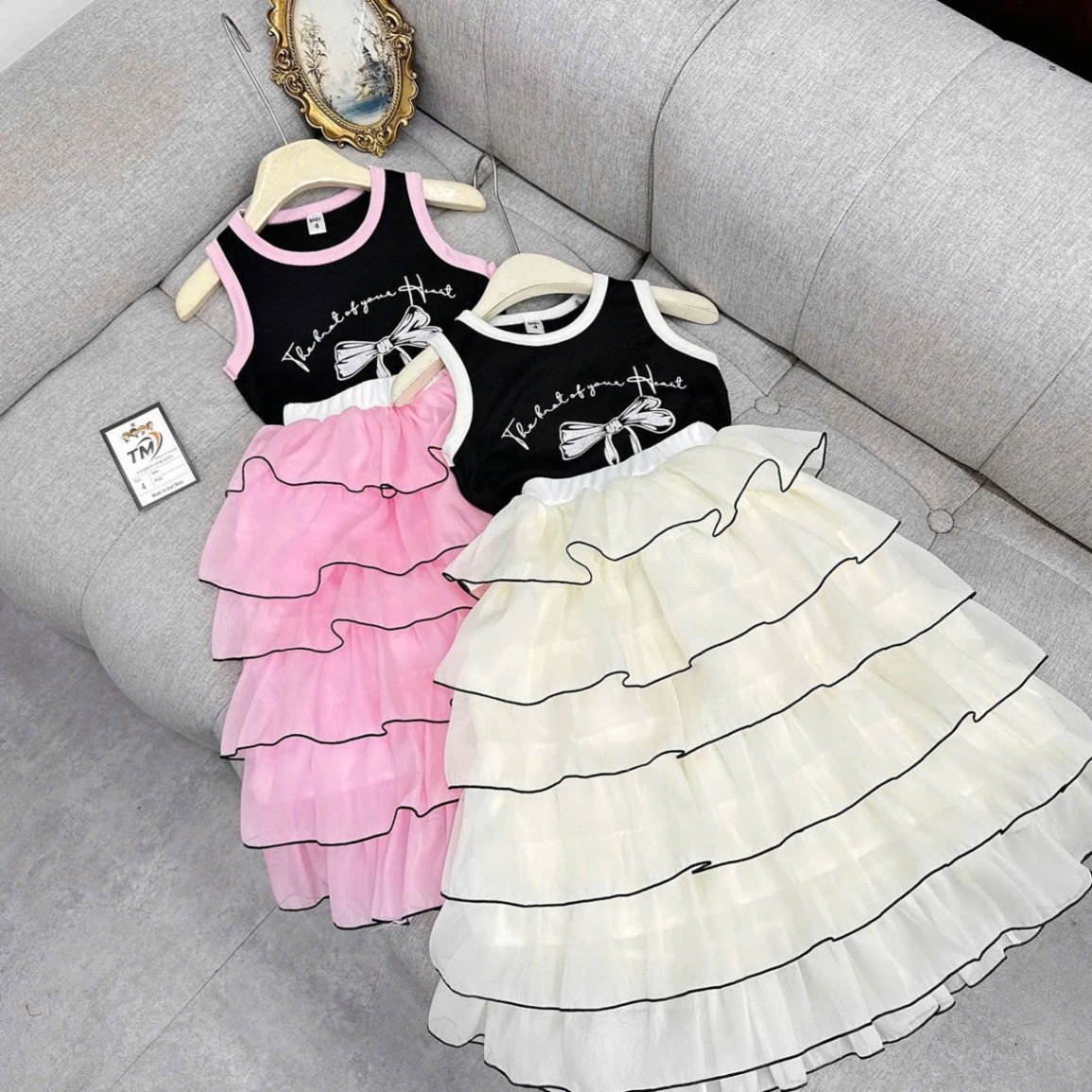 Sét váy hình nơ phối thân tầng tơ óng bé gái
