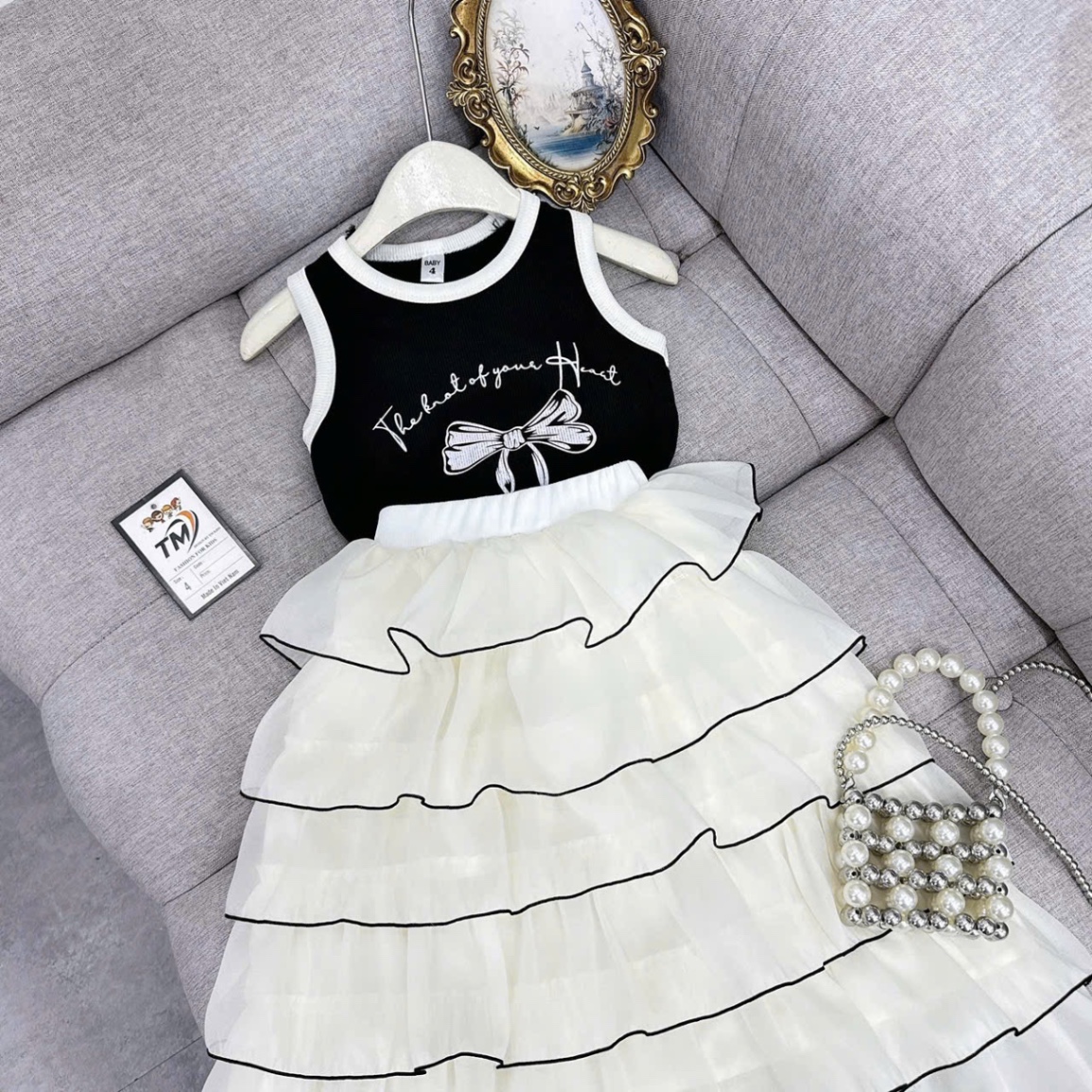 Sét váy hình nơ phối thân tầng tơ óng bé gái