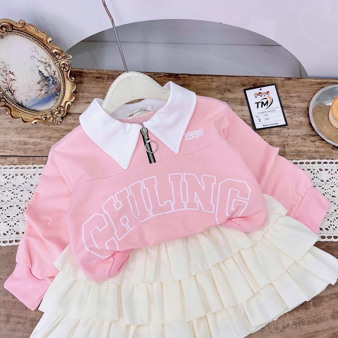 Sét áo nỉ hồng cv tầng kem bé gái