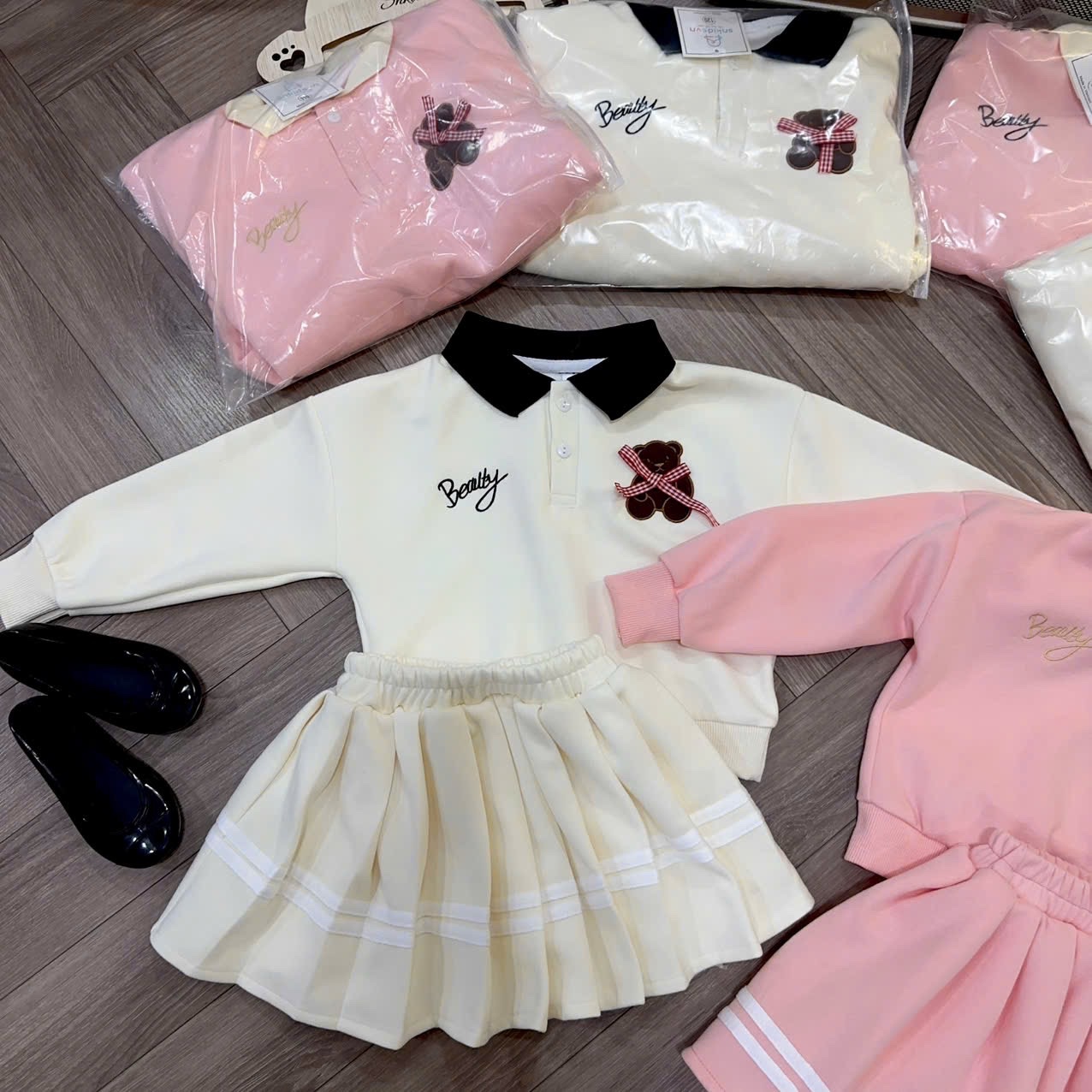 Sét bộ nỉ gấu kem hồng cv dập ly bé gái
