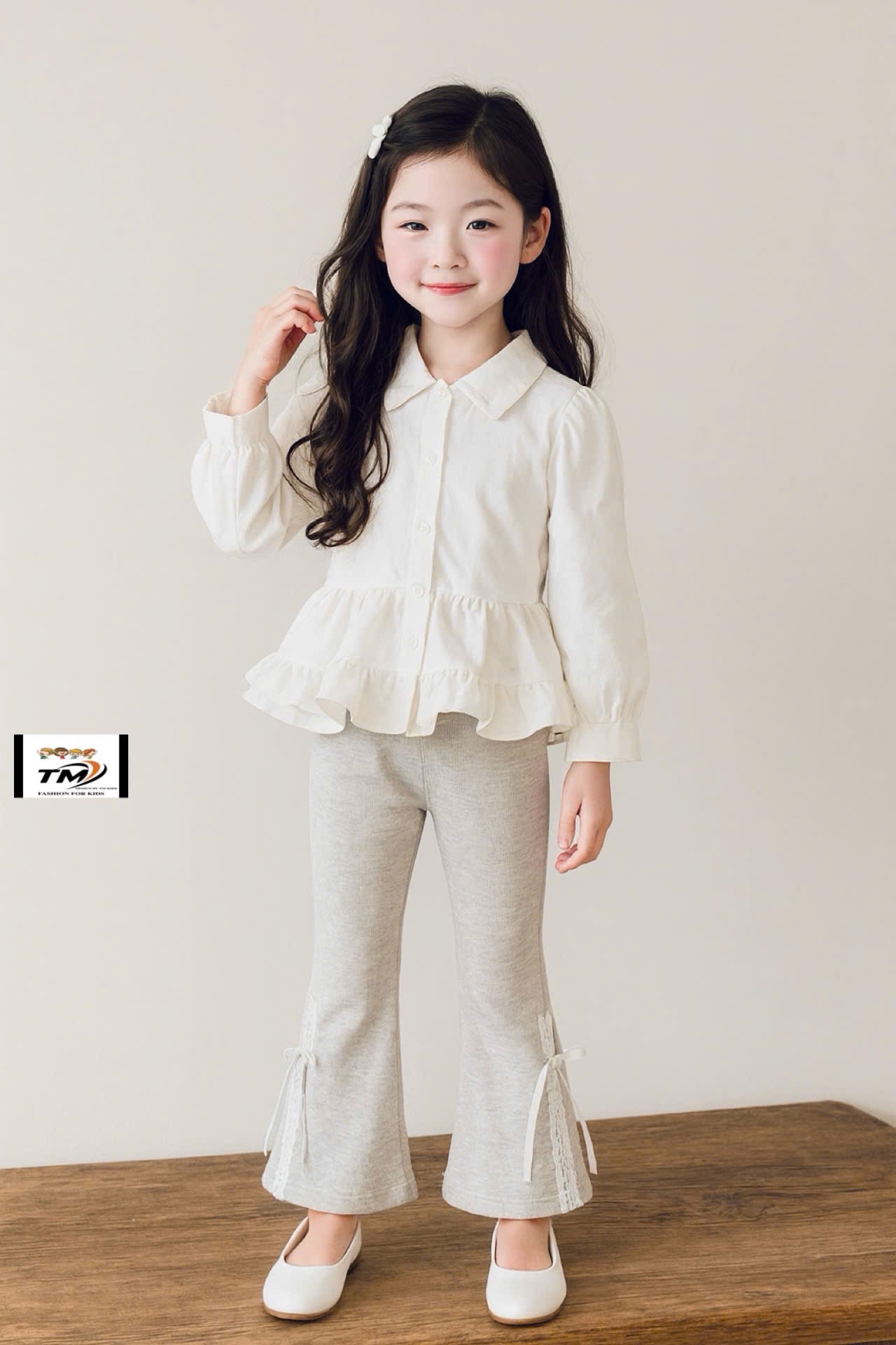 Sét áo sơ mi bèo quần tăm loe đính nơ bé gái