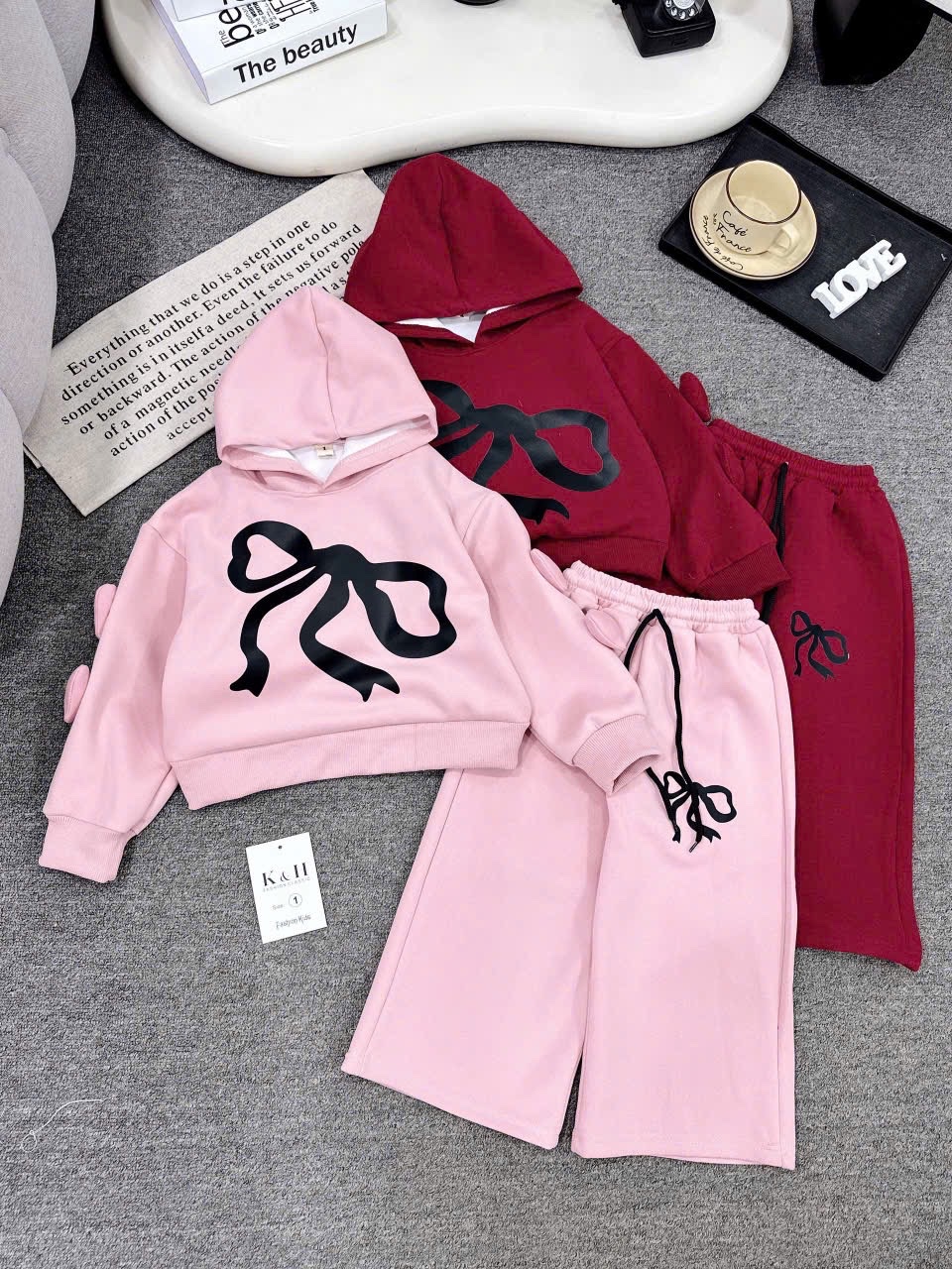 Sét bộ nỉ hình nơ áo mũ liền quần xuông bé gái