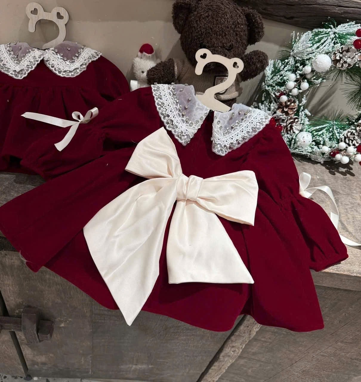 Váy nhung đỏ babydoll nơ sau xk bé gái